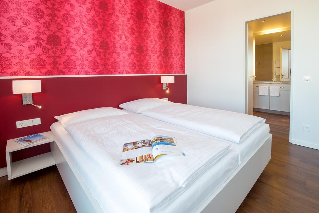 Carat Apartments Grömitz Habitación foto