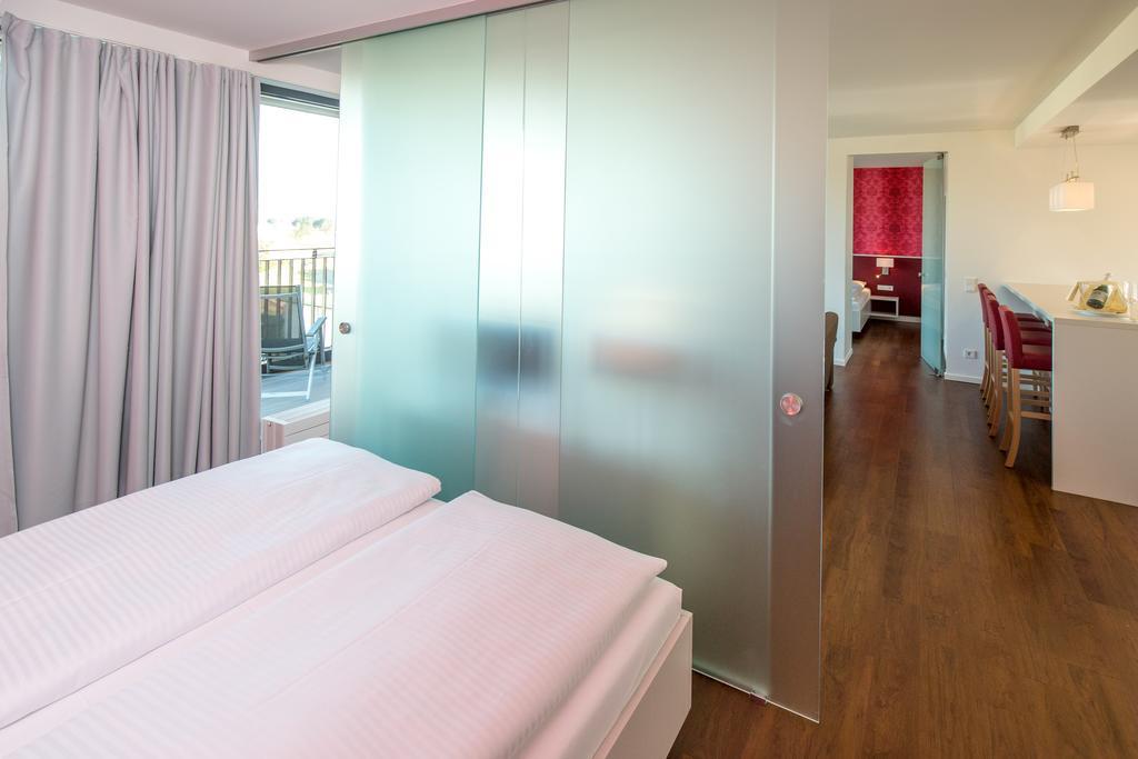 Carat Apartments Grömitz Habitación foto