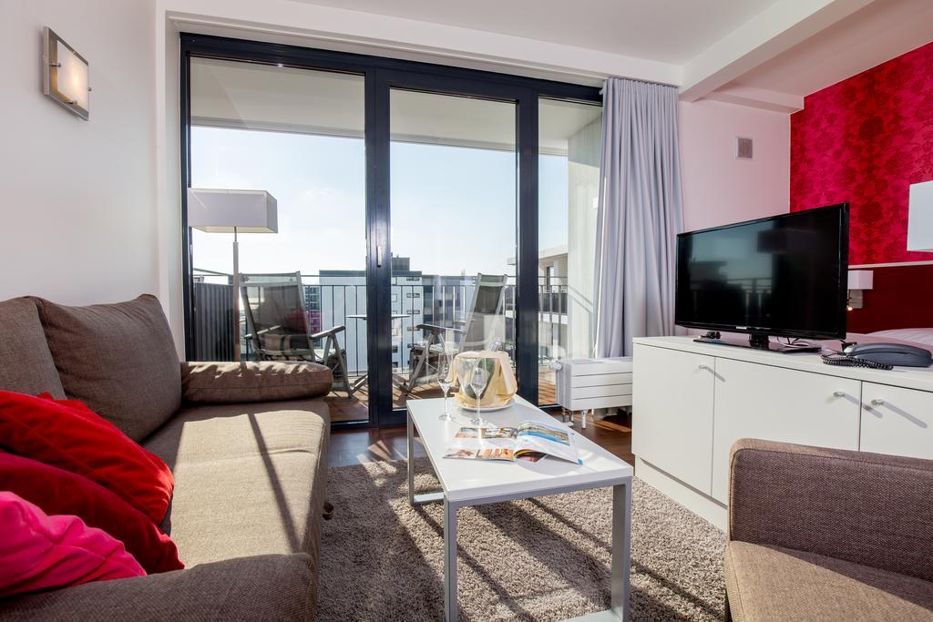 Carat Apartments Grömitz Habitación foto