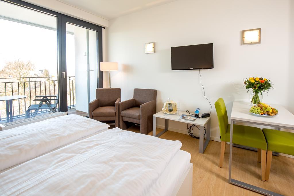 Carat Apartments Grömitz Habitación foto